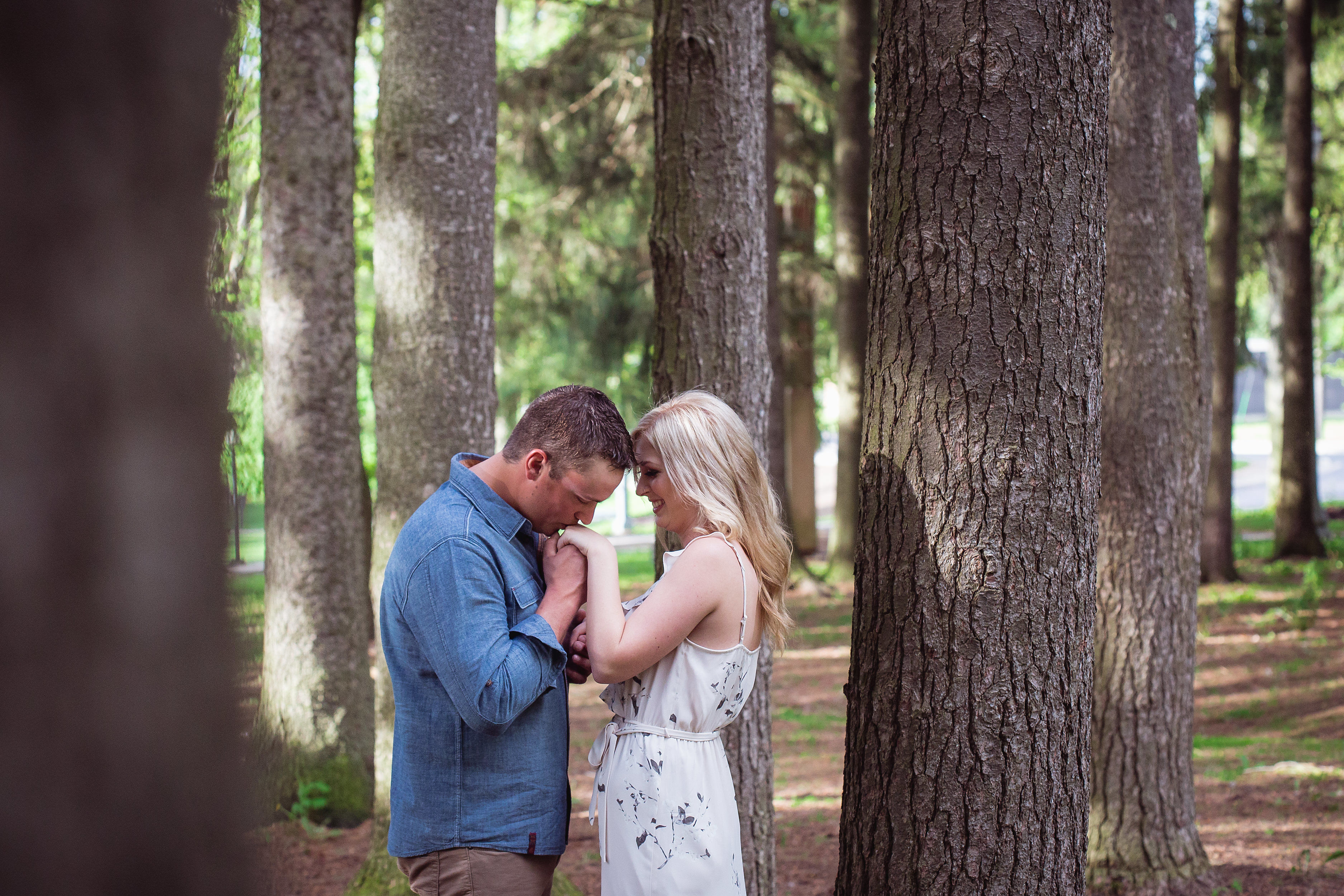 Stratford-Wedding-Photography-Confederation-Park-Engagement-Love-Sprouts-Photography-Groom-Kissing-Hands